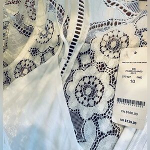 Bebe size 10 white lace dress